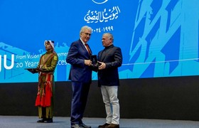 King of Jordan Honors Former University President Andreas Geiger